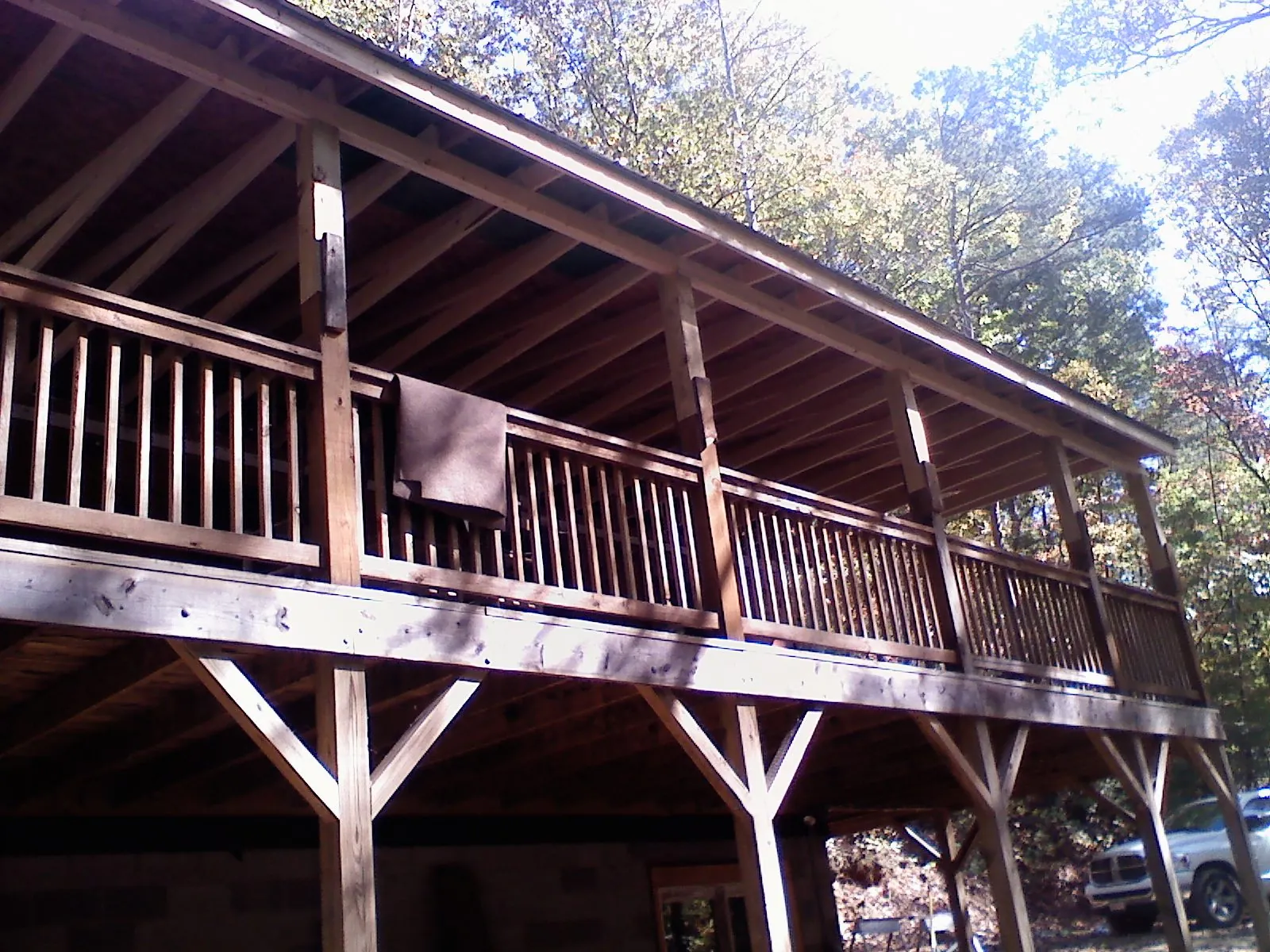 Timber framing under a new elevated porch and deck — Roof Leak Repair in New Matamoras by Roofing Brothers